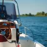 white and brown boat